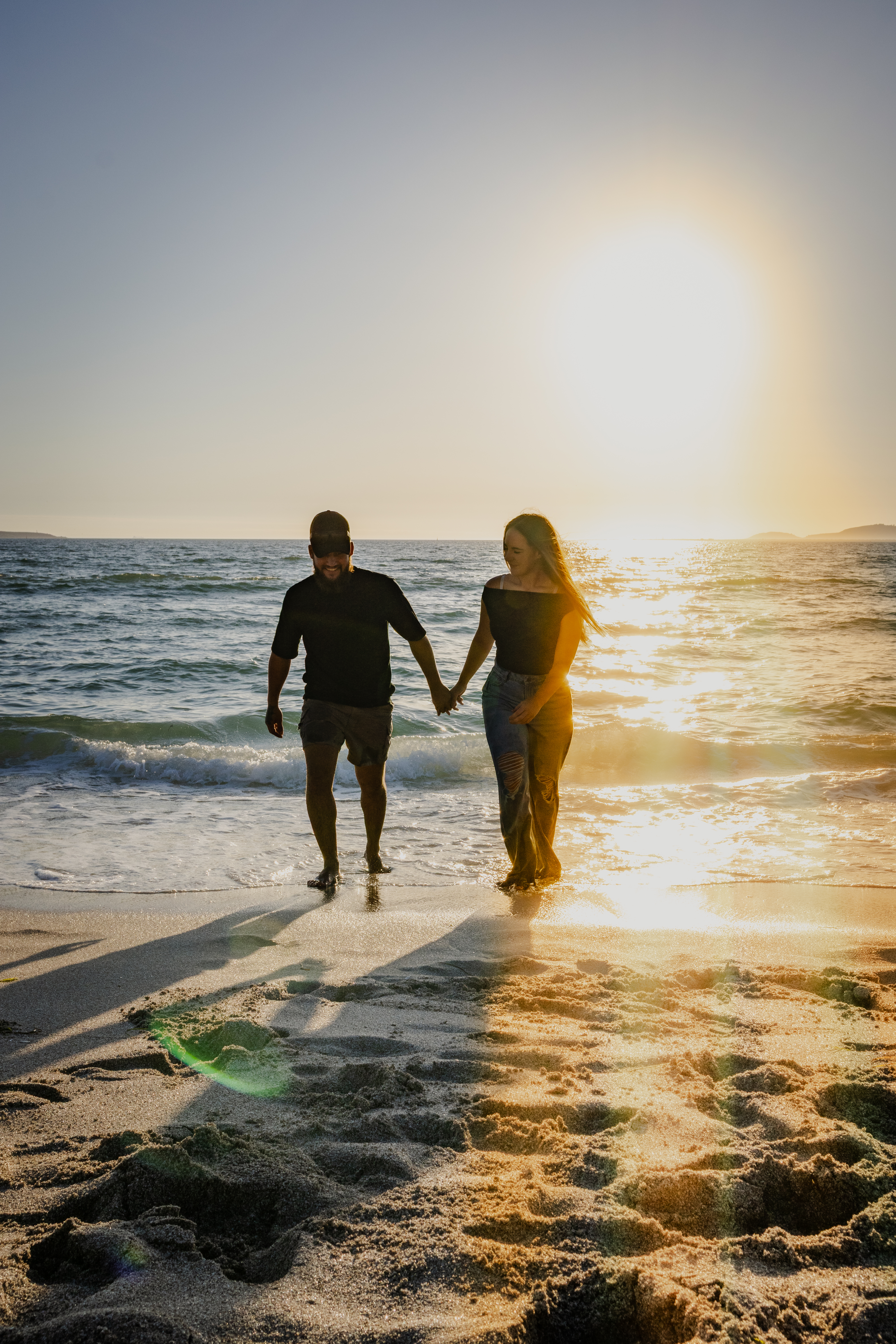 Couple walking into the sunset