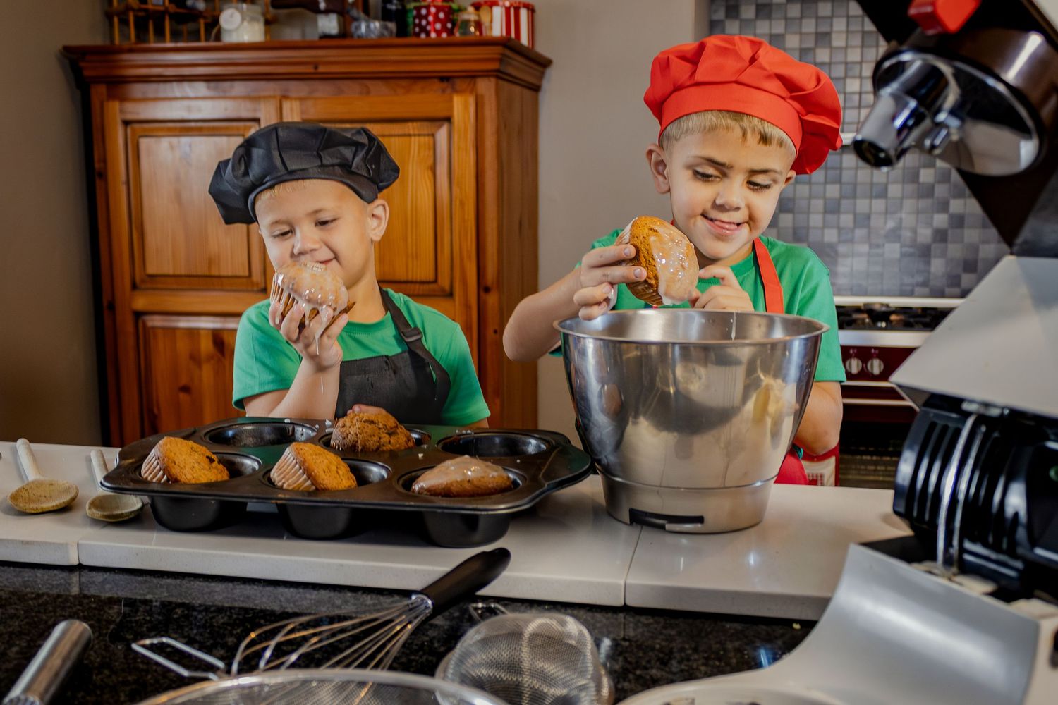 Children cooking together by the stove