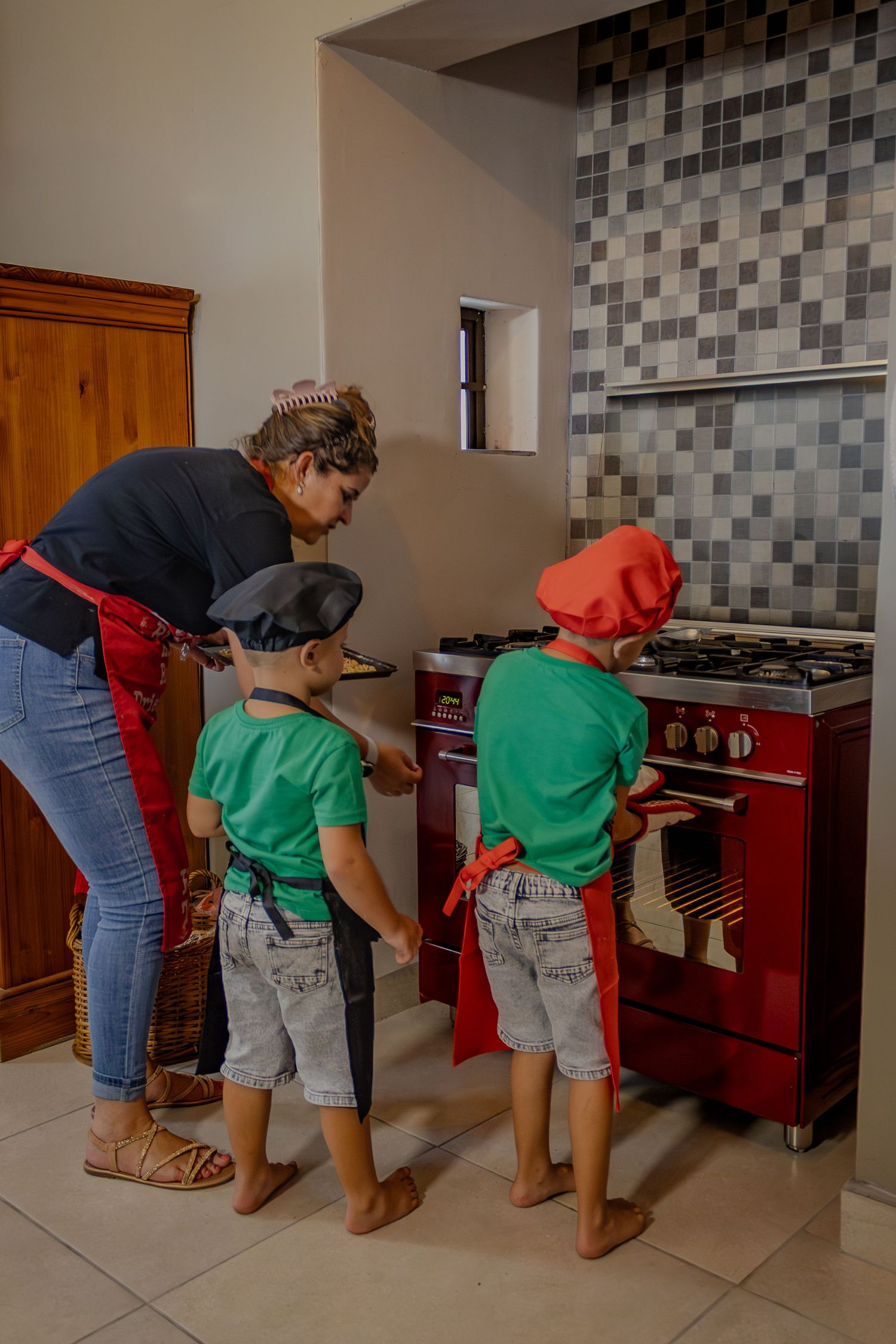Parent and child baking together in the kitchen